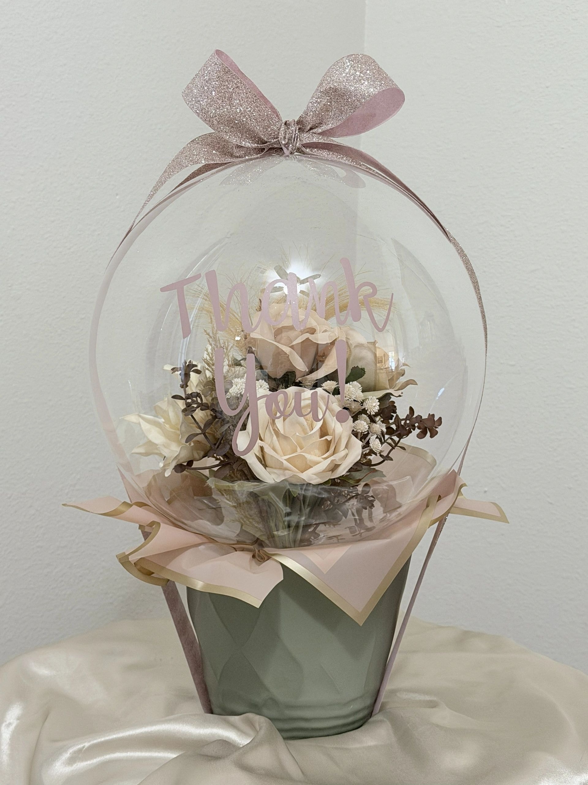 Custom balloon gift arrangement.